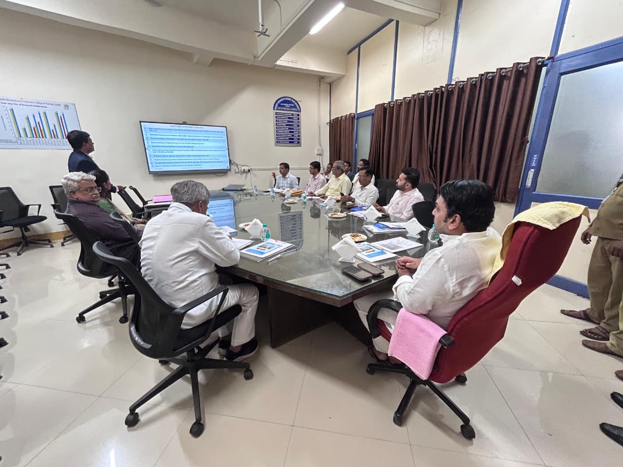 Dr. Suresh Kumar Ray, In-Charge Principal, presented the college report