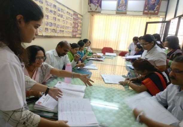 TalathiTakingParentTeacherMeeting